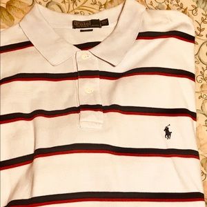 White with blue & red stripes polo. like new